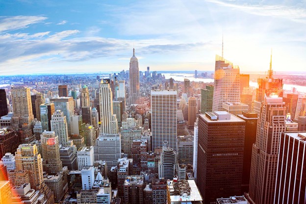 Aerial view of Manhattan skyline at sunset, New York City - Shutterstock