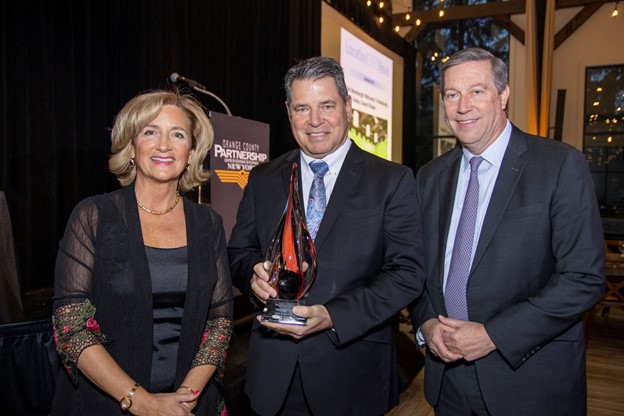 From Left to Right: OCP President & CEO, Maureen Halahan; Garnet Heath President & CEO Scott Batulis; OCP Chairman of the Board, Michael Gilfeather